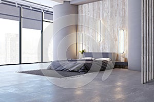 Modern bedroom interior with expansive city view and wooden accents. Urban living concept.
