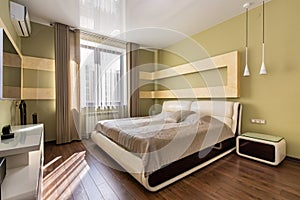 Modern bedroom in luxury apartment