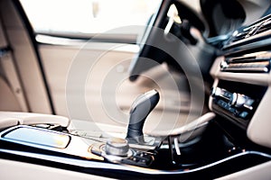 Modern beige interior of new car, close-up details