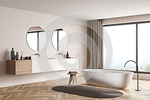 Modern beige panoramic bathroom with two round mirrors. Corner view