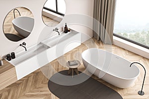 Modern beige panoramic bathroom with two round mirrors. Top view