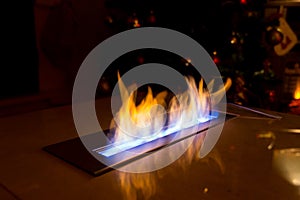 Modern bio fireplace in the marble slab