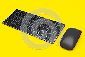 Modern black aluminum computer keyboard and mouse isolated on yellow background.