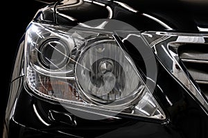 Modern black car headlights.