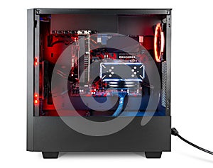 modern black desktop gaming pc with red led lights fan air cooler isolated white background. computer hardware technology concept