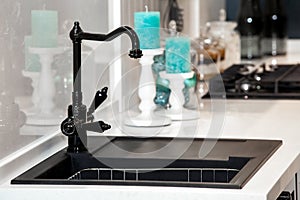 Modern black kitchen sink and faucet