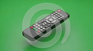 Modern Black Remote Control with Number Pad on Green Background, Clean Design