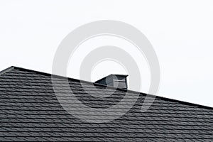 Modern black roof. Types of a roof of roofs. New house