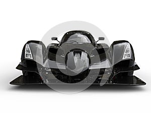 Modern black super sports race car - front view closeup shot