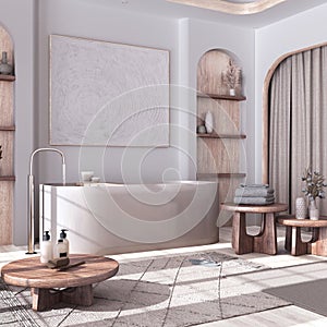 Modern bleached wooden bathroom with curtains, bathtub, tables and carpets in white and beige tones. Parquet floor and arched door