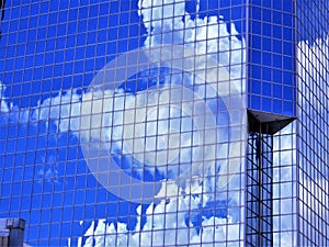 Nimbus clouds reflected in town office building, Tampa