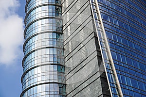 Modern blue glass wall of office building