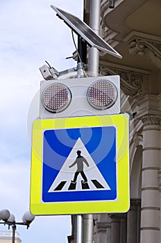 Modern blue warning road sign