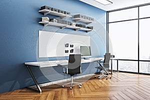 Modern blue workplace with ÃÂomputer on table