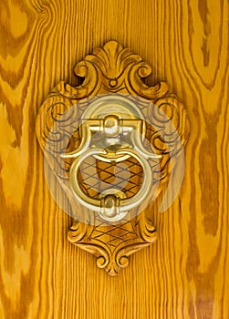 Modern brass door knocker