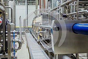 Modern brewery interior. Equipment of beer production line