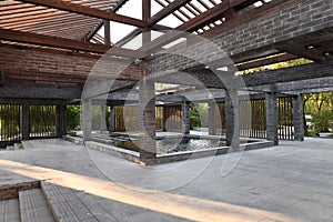 Modern brick building with water flow photo
