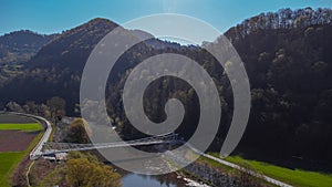 Modern bridge for bicycles over Savinja river in the Celje region on the bike path between Lasko and Celje. Modern connection