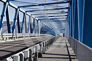 Modern bridge construction and road going through the bridge