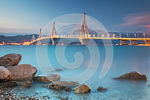 Modern Bridge at the evening night time with illuminations. Rion-Antirion Bridge