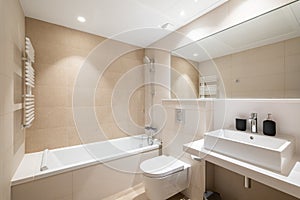Modern bright bathroom in renovated luxury apartment.