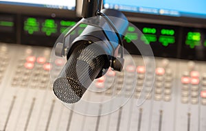 Modern Broadcasting Studio Microphone Over Audio Mixer Board