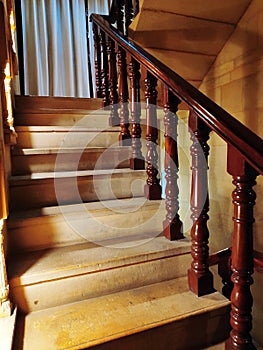 Modern brown oak wooden stairs.