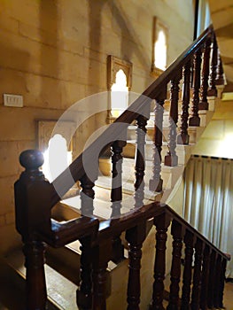 Modern brown oak wooden stairs.