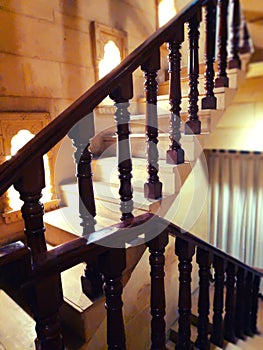 Modern brown oak wooden stairs.