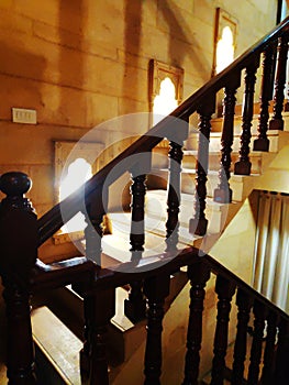 Modern brown oak wooden stairs.