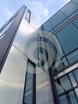 Modern building architecture of glass entrance geometric design