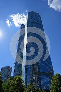 Modern building  blue sky and white clouds background