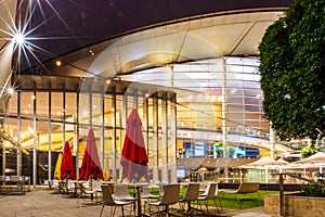 Modern Building and Cafe by Night