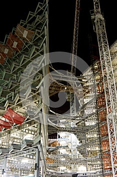 Modern building construction at night