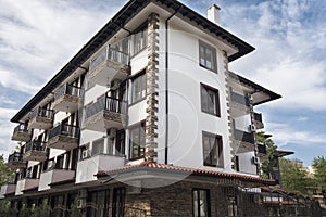 Modern Building Exterior. Facade of a Modern Apartment Building. Vacation Complex Hotel Building, With Stone Tiling Facade