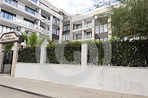 Modern Building Exterior. Facade of a Modern Apartment Building. Vacation Complex Hotel Building, With Stone Tiling Facade