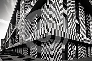 modern building facade with geometric patterns and lines, creating bold contrast