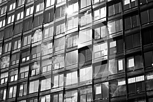 Modern building facade , office windows sky reflection