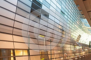 Modern building facade pattern with reflecting windows