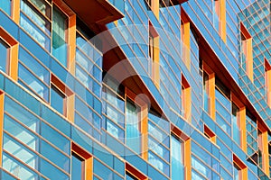 Modern building mirror facade in blue tone