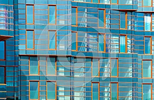 Modern building mirror facade in blue tone
