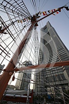 Modern building and sailboat masts