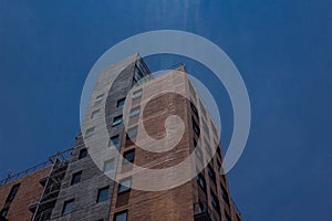 Modern building and the sky solid blue photo