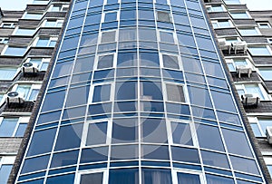 Modern building with tinted windows, low angle