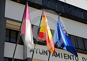 Flags in Puertollano City Hall, Ciudad Real Province, Spain photo