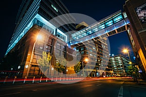 Modern buildings along Lombard Street at night, in downtown Baltimore, Maryland