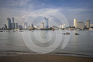 modern buildings behind the shore in XiaMen