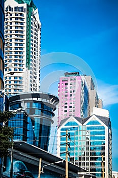 The modern buildings and blue sky background at Sathorn road Bangkok Thailand