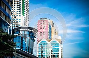 The modern buildings and blue sky background at Sathorn road Bangkok Thailand