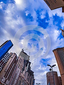 modern buildings blue sky clouds constructions